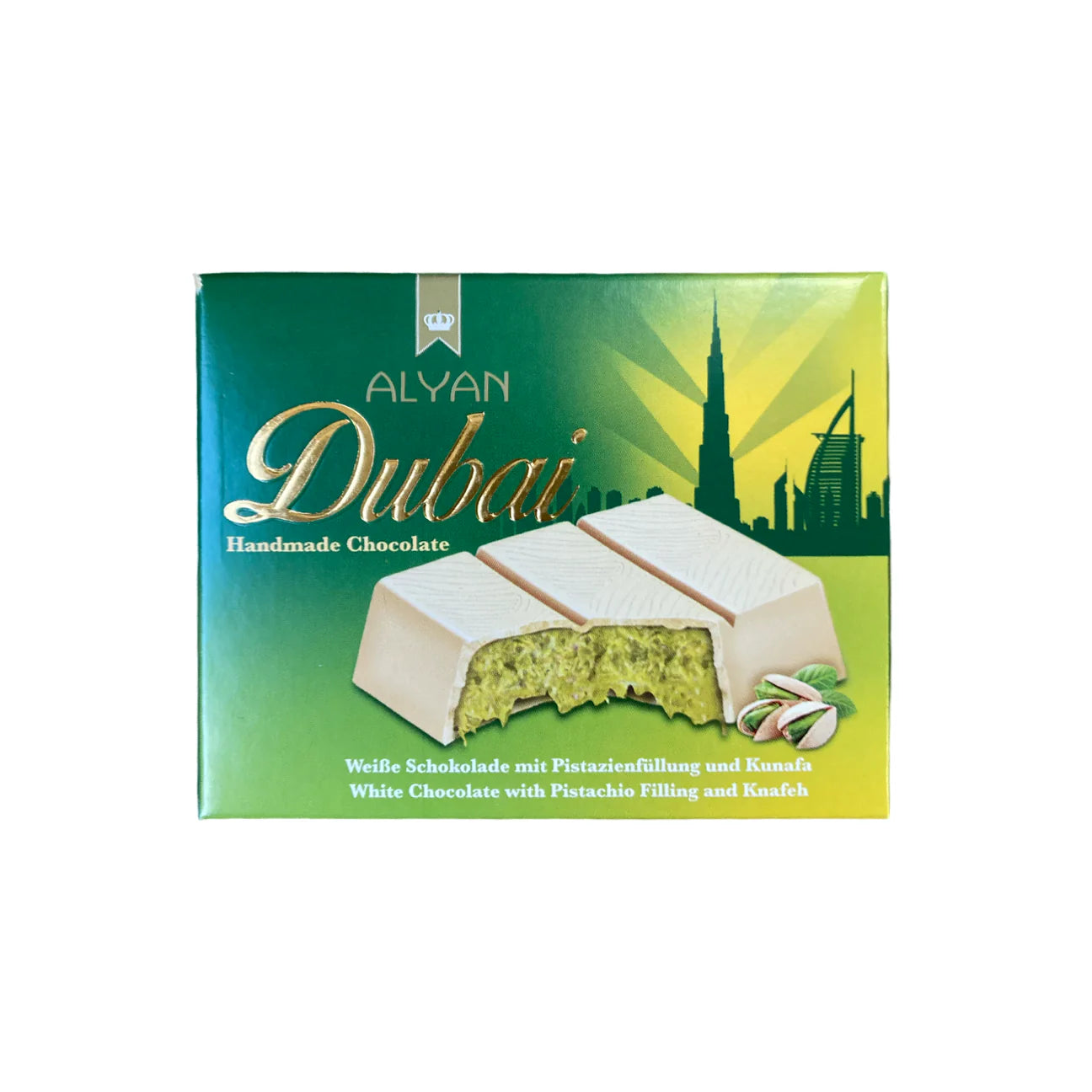 Le Dubai Alyan Chocolat Blanc de MIDI MINUIT présente une image de chocolat blanc fourré à la pistache et au kunafa. Son emballage présente un dégradé vert et jaune avec des silhouettes de bâtiments de Dubaï, capturant le charme des confiseries orientales.