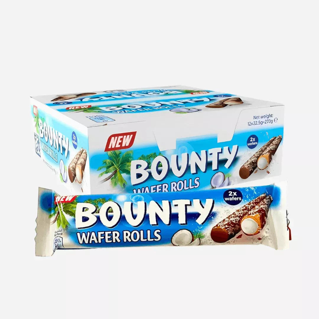 Les rouleaux de gaufrettes Bounty MIDI MINUIT (22,5 g) sont présentés dans un emballage bleu et blanc pratique représentant des palmiers tropicaux. Chaque emballage individuel présente des rouleaux de gaufrettes croustillants avec une garniture à la noix de coco et au chocolat, offrant une commodité délicieuse.
