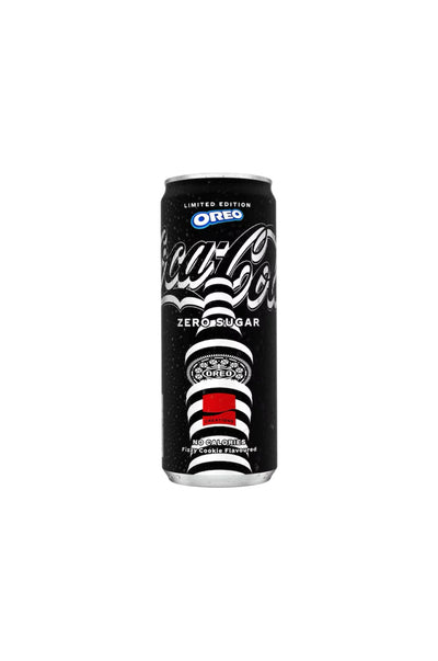 Une canette noire de 330 ml de Coca-Cola Oreo de MIDI MINUIT présente la marque Oreo avec le texte « Édition Limitée » et « Sans sucre », comportant les logos Oreo et Coca-Cola, ainsi quune illustration en bas dOreos empilés.